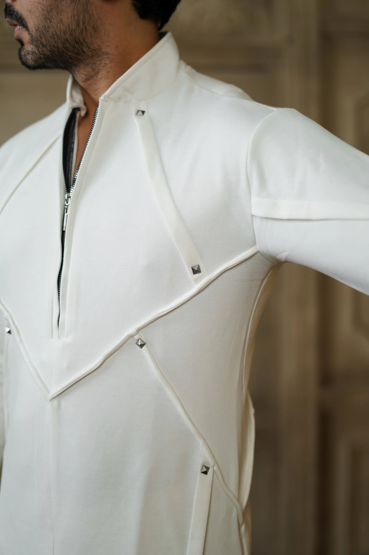 STRETCH PLETE AND STUDDED WHITE KURTA WITH PANTS