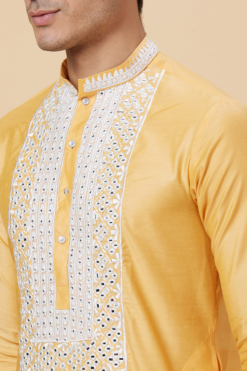 KURTA WITH MIRROR WORK EMBROIDERY AND APPLIQUE DETAILS
